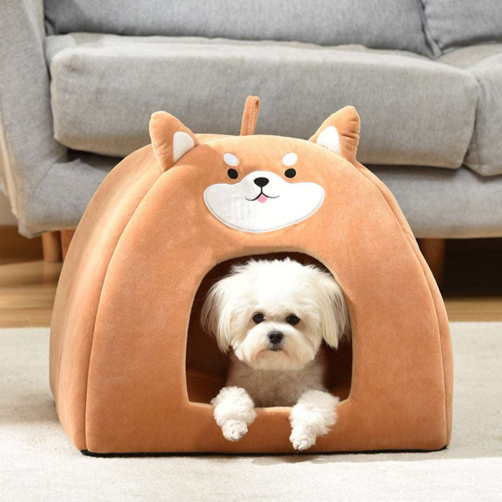 Autumn And Winter soft plush brown pet bed in the shape of a dog with ears and face detailing, featuring a small white dog inside