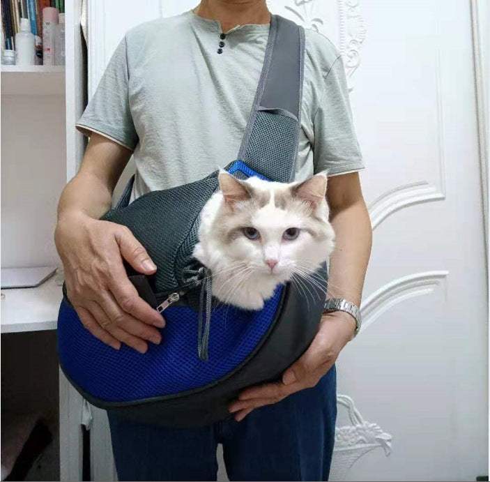Bag dogs and cats carrier in blue and charcoal mesh with black trim, worn across the body with a white cat inside