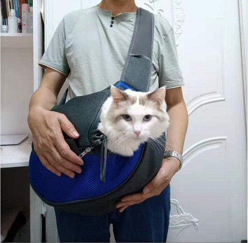 Bag dogs and cats carrier in blue and charcoal mesh with black trim, worn across the body with a white cat inside