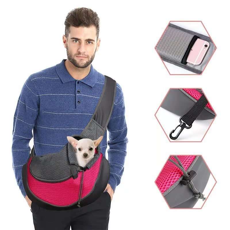 Bag dogs and cats in black and bright pink, with breathable mesh panels, adjustable shoulder strap and a small dog peeking out