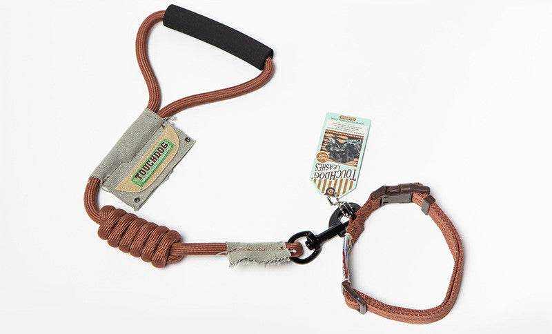 Dog Leash, Leash in brown nylon with a padded black handle, coiled stretch section, and matching adjustable collar