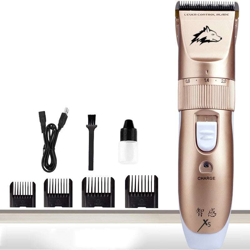 Dog shaver Hair clipper in metallic gold with black blade, four black comb attachments, charging cable, cleaning brush, and lubricating oil bottle