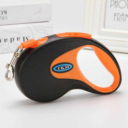 Dog Traction Rope with a black and orange ABS retractable leash housing, ergonomic handle, and silver metal clip