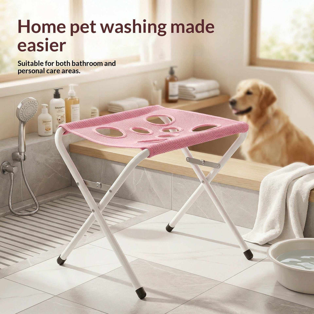 Foldable Pet Bathing Stand with a pink mesh hammock top featuring several openings on a white folding frame